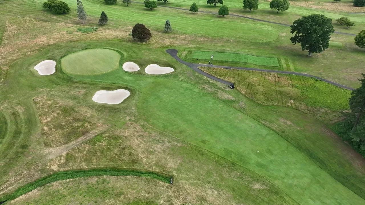 Aerial view of a green and bunkers captured during drone mapping at a Connecticut golf club